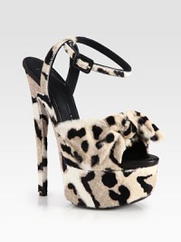 Trend-worthy design of lush calf hair with a daring leopard print and big bow, lifted by an ultra-high heel and platform. Self-covered heel, 6½ (165mm)Covered platform, 2¼ (60mm)Compares to a 4¼ heel (110mm)Leopard print calf hair upperAdjustable ankle strapLeather liningLeather and rubber solePadded insoleMade in Italy