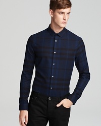 A sleek fit and signature check pattern lend statement style to this Burberry London shirt. A sleek fit and signature check pattern lend statement style to this Burberry London shirt.