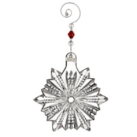 Sparkling Waterford crystal reflects light beautifully, lending a magical glittering element to the holiday tree. Sparkling Waterford crystal reflects light beautifully, lending a magical glittering element to the holiday tree.
