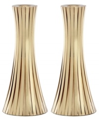 Always radiant, the Gold Vertical candlestick from Donna Karan Lenox is wrapped in long metal channels that overlap to create a simple cone shape. Always radiant, the Gold Vertical candlestick from Donna Karan Lenox is wrapped in long metal channels that overlap to create a simple cone shape.