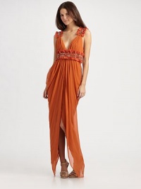 Beaded accents and raw edge fabric create dramatic impact on this long and flowy silk number, finished with side draped panels.V-neck Embellished Empire waist and shoulder straps Draped silk side panels Side zip closure About 27½ from shoulder to hem Fully lined Raw edge cotton trim Silk; dry clean Imported Beaded accents and raw edge fabric create dramatic impact on this long and flowy silk number, finished with side draped panels.V-neck Embellished Empire waist and shoulder straps Draped silk side panels Side zip closure About 27½ from shoulder to hem Fully lined Raw edge cotton trim Silk; dry clean Imported
