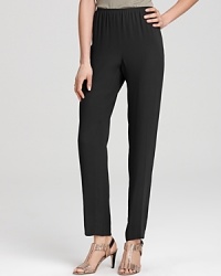 Effortless yet elegant, silk Eileen Fisher Petites pants slip on for laidback luxury. Play up the tapered silhouette with a sleek heel. Effortless yet elegant, silk Eileen Fisher Petites pants slip on for laidback luxury. Play up the tapered silhouette with a sleek heel.