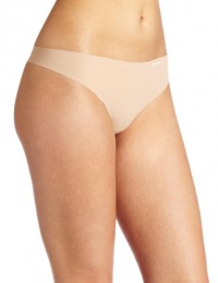 Calvin Klein Women's Invisibles Thong, Light Caramel, Medium Calvin Klein Women's Invisibles Thong, Light Caramel, Medium