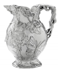 Invite fresh whimsy to the table on the wings of the Butterfly pitcher. This springtime motif from Arthur Court serveware is swarming with butterflies and sand cast in gleaming aluminum--a delight for nature lovers. Invite fresh whimsy to the table on the wings of the Butterfly pitcher. This springtime motif from Arthur Court serveware is swarming with butterflies and sand cast in gleaming aluminum--a delight for nature lovers.