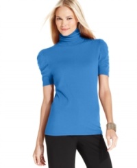 Style&co. ruched the sleeves of this fitted petite turtleneck sweater for a femme finishing touch. Style&co. ruched the sleeves of this fitted petite turtleneck sweater for a femme finishing touch.