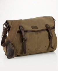 Authentic leather accents make this versatile canvas messenger bag a suitable carryall for work or weekend. Authentic leather accents make this versatile canvas messenger bag a suitable carryall for work or weekend.