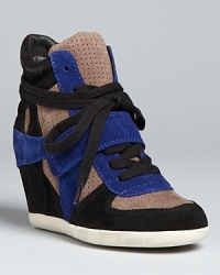 So retro, so right on; Ash delivers on the sneaker bootie trend, big time, in '80s-flashback, colorblocked high tops that are totally awesome. So retro, so right on; Ash delivers on the sneaker bootie trend, big time, in '80s-flashback, colorblocked high tops that are totally awesome.