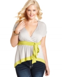 Wrap up a super-cute look with ING's short sleeve plus size top, highlighted by a colorblocked pattern. Wrap up a super-cute look with ING's short sleeve plus size top, highlighted by a colorblocked pattern.