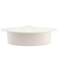 A bread basket woven of crisp white porcelain with embossed detail lends easy elegance to casual meals. From Martha Stewart Collection. A bread basket woven of crisp white porcelain with embossed detail lends easy elegance to casual meals. From Martha Stewart Collection.