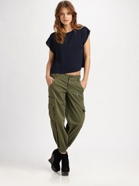 Minimalist-chic in a slightly boxy silk shift, styled with a shapely crossover back.JewelneckDropped shouldersCap sleevesCrossover backSilkDry cleanImportedModel shown is 5'8½ (174cm) wearing US size Small. Minimalist-chic in a slightly boxy silk shift, styled with a shapely crossover back.JewelneckDropped shouldersCap sleevesCrossover backSilkDry cleanImportedModel shown is 5'8½ (174cm) wearing US size Small.