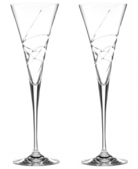 A fanciful cut pattern contrasts the timeless silhouette of Adorn crystal toasting flutes, featuring the exquisite craftsmanship of Lenox. A fanciful cut pattern contrasts the timeless silhouette of Adorn crystal toasting flutes, featuring the exquisite craftsmanship of Lenox.
