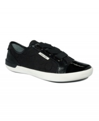 Step into fashion. Calvin Klein's Trinah Logo sneakers are proof that even sneakers are embracing the capped-toe trend. Step into fashion. Calvin Klein's Trinah Logo sneakers are proof that even sneakers are embracing the capped-toe trend.