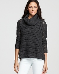 Transition to cooler weather with this breezy, open knit James Perse sweater, crafted from a soft wool blend, with a stylishly-draped funnel neck silhouette. Transition to cooler weather with this breezy, open knit James Perse sweater, crafted from a soft wool blend, with a stylishly-draped funnel neck silhouette.