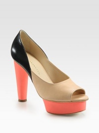 Smooth leather in a modern colorblock design with a chunky heel and an island platform. Self-covered heel, 4½ (115mm)Island platform, 1 (25mm)Compares to a 3½ heel (90mm)Leather upperLeather lining and solePadded insoleImportedOUR FIT MODEL RECOMMENDS ordering true size. Smooth leather in a modern colorblock design with a chunky heel and an island platform. Self-covered heel, 4½ (115mm)Island platform, 1 (25mm)Compares to a 3½ heel (90mm)Leather upperLeather lining and solePadded insoleImportedOUR FIT MODEL RECOMMENDS ordering true size.