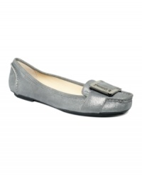 Shimmery and comfy. Calvin Klein's Meranda features a eye-grabbing buckle across the toe.