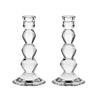 Inspired by modern architectural elements and the faceted gems of the designer's jewelry, Vera Wang's Orient, these luminous Vera Wang candlesticks lend timeless grandeur to your table. Inspired by modern architectural elements and the faceted gems of the designer's jewelry, Vera Wang's Orient, these luminous Vera Wang candlesticks lend timeless grandeur to your table.