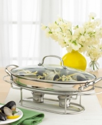 Serve up delicious food and warm hospitality with Cuisinart's elegant 13 1/2 buffet server. This all-purpose, stainless piece saves you the hassle of washing a multitude of pots and pans - it goes straight from the stovetop or oven right to the serving table. Two tea light candles placed in the warming stand are all it takes to keep your food fresh and at the perfect serving temperature for hours. A clear glass lid locks in heat while proudly displaying your culinary masterpiece. Limited lifetime warranty. Serve up delicious food and warm hospitality with Cuisinart's elegant 13 1/2 buffet server. This all-purpose, stainless piece saves you the hassle of washing a multitude of pots and pans - it goes straight from the stovetop or oven right to the serving table. Two tea light candles placed in the warming stand are all it takes to keep your food fresh and at the perfect serving temperature for hours. A clear glass lid locks in heat while proudly displaying your culinary masterpiece. Limited lifetime warranty.