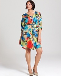 A tropical rush, this T Bags Plus shirt dress turns heads with lush florals and saturated hues. Team with polished pumps for instant getaway glamour. A tropical rush, this T Bags Plus shirt dress turns heads with lush florals and saturated hues. Team with polished pumps for instant getaway glamour.