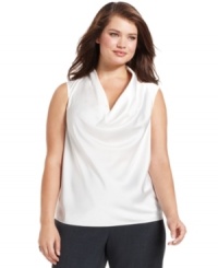 An elegant plus size shell from Calvin Klein pulls your whole look together. The gracefully draped cowl neckline adds a soft touch to structured suits and tailored skirts. An elegant plus size shell from Calvin Klein pulls your whole look together. The gracefully draped cowl neckline adds a soft touch to structured suits and tailored skirts.