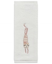 Animal attraction. A super-soft cotton washcloth embellished with a friendly feline turns tub time into fun time.