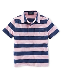 A classic polo is rendered in striped jersey-knit cotton for a preppy look. A classic polo is rendered in striped jersey-knit cotton for a preppy look.