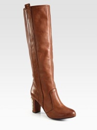 An unexpected metal heel adds modern flair to this traditional tall silhouette of smooth leather. Self-covered heel with metal hardware, 3 (75mm)Shaft, 15½Leg circumference, 14Leather upperPull-on styleLeather lining and solePadded insoleImported An unexpected metal heel adds modern flair to this traditional tall silhouette of smooth leather. Self-covered heel with metal hardware, 3 (75mm)Shaft, 15½Leg circumference, 14Leather upperPull-on styleLeather lining and solePadded insoleImported