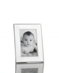 Delicately beaded edges add to the resplendent beauty of this Silver Bead picture frame from Martha Stewart Collection. Simply timeless in brilliant silver plate, it brings new attention to the past. With velvet backing. Delicately beaded edges add to the resplendent beauty of this Silver Bead picture frame from Martha Stewart Collection. Simply timeless in brilliant silver plate, it brings new attention to the past. With velvet backing.