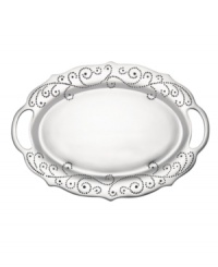 With a feminine edge and pretty perforated detail, the large French Perle handled tray from Lenox's collection of serveware and serving dishes holds roast turkey, grilled fish, or a pile of BLTs with decidedly vintage charm. In pure aluminum, it's a brilliant complement to French Perle dinnerware. (Clearance) With a feminine edge and pretty perforated detail, the large French Perle handled tray from Lenox's collection of serveware and serving dishes holds roast turkey, grilled fish, or a pile of BLTs with decidedly vintage charm. In pure aluminum, it's a brilliant complement to French Perle dinnerware. (Clearance)