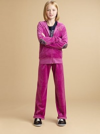 Soft, plush velour with a cozy hood and touches of Juicy sparkle.Attached hoodFront zip with J pullLong sleeves with ribbed knit cuffs and sparkle heart elbow patchesBeaded JC chest logoSplit kangaroo pocketsRibbed knit bottom76% cotton/24% polyesterMachine washImported Soft, plush velour with a cozy hood and touches of Juicy sparkle.Attached hoodFront zip with J pullLong sleeves with ribbed knit cuffs and sparkle heart elbow patchesBeaded JC chest logoSplit kangaroo pocketsRibbed knit bottom76% cotton/24% polyesterMachine washImported