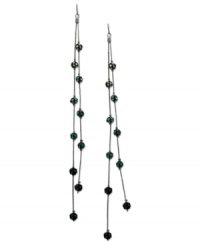 Fire up your evening with these two-row linear earrings from GUESS. Montana, blue zircon and aqua crystal-embellished fireballs hang from metal chains. Crafted in sprayed jet mixed metal. Approximate drop: 7 inches. Fire up your evening with these two-row linear earrings from GUESS. Montana, blue zircon and aqua crystal-embellished fireballs hang from metal chains. Crafted in sprayed jet mixed metal. Approximate drop: 7 inches.