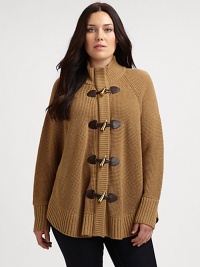 This exquisite knit sweater with glamorous toggles and a relaxed-yet-feminine fit would work perfectly with slim-fitting jeans.Mock collarRaglan sleevesToggle closureFront zipperRibbed trimAbout 30 from shoulder to hemAcrylic/woolDry cleanImported This exquisite knit sweater with glamorous toggles and a relaxed-yet-feminine fit would work perfectly with slim-fitting jeans.Mock collarRaglan sleevesToggle closureFront zipperRibbed trimAbout 30 from shoulder to hemAcrylic/woolDry cleanImported