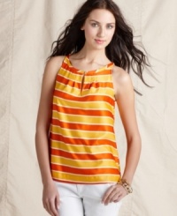 Go bold in this Tommy Hilfiger tank top, featuring bright stripes and a chic, vintage-inspired silhouette. Pair it with white jeans for a beach soiree! Go bold in this Tommy Hilfiger tank top, featuring bright stripes and a chic, vintage-inspired silhouette. Pair it with white jeans for a beach soiree!