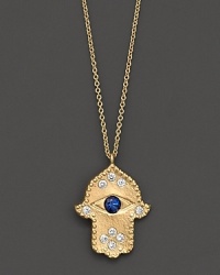 Sparkling diamonds and a sapphire eye watch over you. Set in 14K gold Hamsa pendant. Sparkling diamonds and a sapphire eye watch over you. Set in 14K gold Hamsa pendant.
