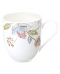 Well-crafted blooms create the illusion of texture on the sleek white porcelain of Oleg Cassini's Kavita mug. A charming complement to the dinnerware collection. Well-crafted blooms create the illusion of texture on the sleek white porcelain of Oleg Cassini's Kavita mug. A charming complement to the dinnerware collection.