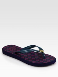 A signature medallion is at the center of this comfortable shape in durable PVC. PVC upperRubber lining and solePadded insoleImportedThis style runs true to size. We recommend ordering your usual size for a standard fit. A signature medallion is at the center of this comfortable shape in durable PVC. PVC upperRubber lining and solePadded insoleImportedThis style runs true to size. We recommend ordering your usual size for a standard fit.