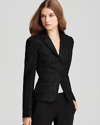Mixing timeless bouclé with solid wool panels, Elie Tahari's Auben jacket lends modern sophistication. Mixing timeless bouclé with solid wool panels, Elie Tahari's Auben jacket lends modern sophistication.