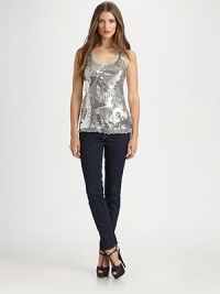 Glittering sequins swirl over the mesh front of this scoopneck tank for a look that's simply-dazzling.ScoopneckWide strapsSequined mesh frontAbout 27 from shoulder to hemFront: 50% viscose/45% rayon/5% lycraBack: rayonHand washImportedModel shown is 5'9 (175cm) wearing US size Small. Glittering sequins swirl over the mesh front of this scoopneck tank for a look that's simply-dazzling.ScoopneckWide strapsSequined mesh frontAbout 27 from shoulder to hemFront: 50% viscose/45% rayon/5% lycraBack: rayonHand washImportedModel shown is 5'9 (175cm) wearing US size Small.