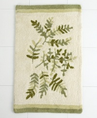 Leafy ferns in forest hues restore the natural order of peace and relaxation in your bath. In cozy 100% cotton, this ivory rug looks and feels fantastic underfoot. With coordinating green trim. Leafy ferns in forest hues restore the natural order of peace and relaxation in your bath. In cozy 100% cotton, this ivory rug looks and feels fantastic underfoot. With coordinating green trim.