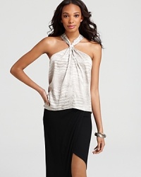 Exuding exotic appeal, this crocodile-print BCBGMAXAZRIA top infuses your wardrobe with a touch of wild style--a magnetic look for a fierce new you. Exuding exotic appeal, this crocodile-print BCBGMAXAZRIA top infuses your wardrobe with a touch of wild style--a magnetic look for a fierce new you.