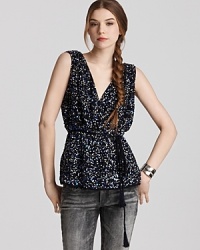 Add sparkle to your night-out look with this sequined V-neck top from French Connection. Add sparkle to your night-out look with this sequined V-neck top from French Connection.