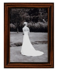 The handcrafted Ebony Italian picture frame from Tizo is layered in rich sepia and black tones, presenting fond memories with classic refinement. The handcrafted Ebony Italian picture frame from Tizo is layered in rich sepia and black tones, presenting fond memories with classic refinement.