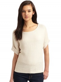 THE LOOKDolman sleeves with fold-back cuffsMixed knit designPullover styleTHE FITAbout 24 from shoulder to hemTHE MATERIAL55% cotton/45% acrylicCARE & ORIGINHand washImportedModel shown is 5'10 (177cm) wearing US size Small. THE LOOKDolman sleeves with fold-back cuffsMixed knit designPullover styleTHE FITAbout 24 from shoulder to hemTHE MATERIAL55% cotton/45% acrylicCARE & ORIGINHand washImportedModel shown is 5'10 (177cm) wearing US size Small.