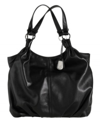 Pretty pleats and soft leather update this classic carry-all tote by Cole Haan. Silvertone hardware and a signature charm add the perfect subtle finishing touches. Pretty pleats and soft leather update this classic carry-all tote by Cole Haan. Silvertone hardware and a signature charm add the perfect subtle finishing touches.