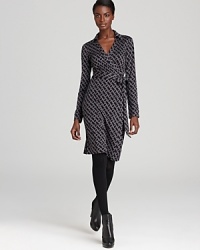 Crafted in signature silk jersey, this DIANE von FURSTENBERG New Jeanne Two wrap dress features a playful chain print on a classic, must-have silhouette. Crafted in signature silk jersey, this DIANE von FURSTENBERG New Jeanne Two wrap dress features a playful chain print on a classic, must-have silhouette.
