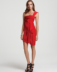 Stand out in a sea of black dresses in this vibrant cocktail frock from BCBGMAXAZRIA. The single crossbody strap travels across the bust, with gathering at the waist and a cascading front ruffle. Stand out in a sea of black dresses in this vibrant cocktail frock from BCBGMAXAZRIA. The single crossbody strap travels across the bust, with gathering at the waist and a cascading front ruffle.