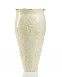 With lush roses and delicate dots carved in ivory porcelain, this classic vase offers a fine setting for fresh bouquets. A scalloped, gold-tipped rim adds an element of grandeur to every arrangement. With lush roses and delicate dots carved in ivory porcelain, this classic vase offers a fine setting for fresh bouquets. A scalloped, gold-tipped rim adds an element of grandeur to every arrangement.