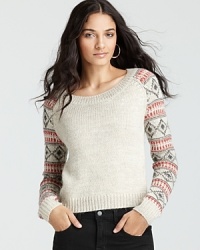 This Ella Moss sweater boasts vibrant argyle sleeves for clever juxtaposition. This Ella Moss sweater boasts vibrant argyle sleeves for clever juxtaposition.