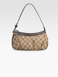 Cosmetic case with heart-shaped interlocking G in GG fabric with leather trim and light goldtone hardware.Adjustable shoulder strap, 7 drop Zip-top closure Fully lined 9W X 5H X 2D Made in Italy Cosmetic case with heart-shaped interlocking G in GG fabric with leather trim and light goldtone hardware.Adjustable shoulder strap, 7 drop Zip-top closure Fully lined 9W X 5H X 2D Made in Italy