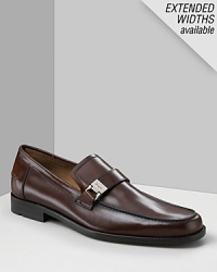 Salvatore Ferragamo Pregiato slides. Leather slides with tonal topstitching and leather strap on front. Brushed silver buckle with Ferragamo engraved on the front. Features a slightly treaded sole for non-slip bottom. Salvatore Ferragamo Pregiato slides. Leather slides with tonal topstitching and leather strap on front. Brushed silver buckle with Ferragamo engraved on the front. Features a slightly treaded sole for non-slip bottom.