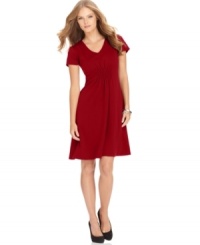 A ponte-knit fabric and a-line silhouette make this petite dress from Elementz ultra-flattering! Pair with your favorite pumps for a charming ensemble.